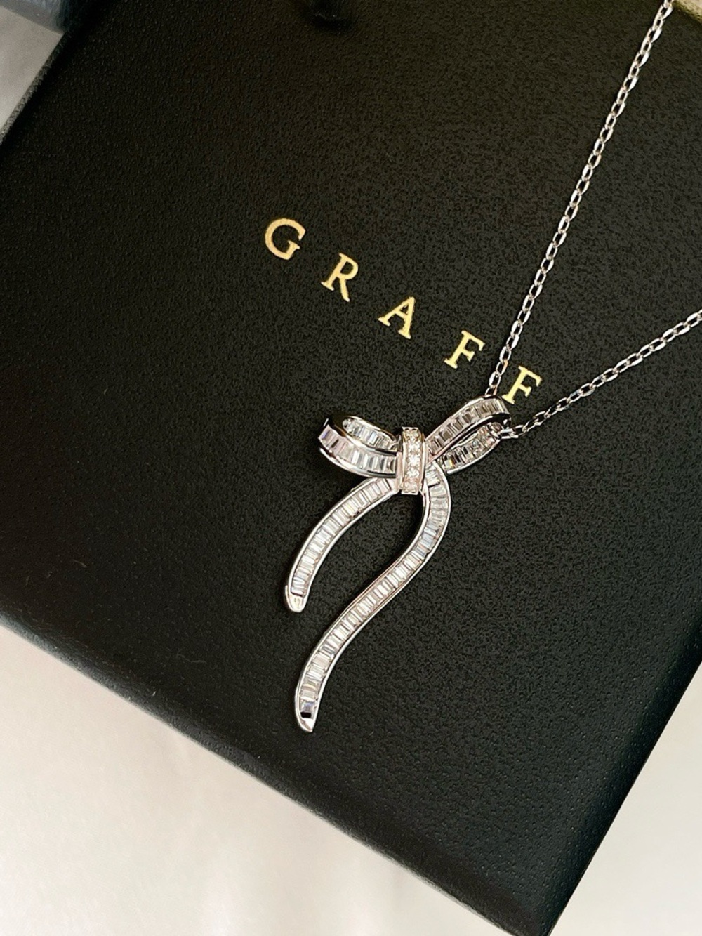 White Gold Diamond Ribbon Pendant Necklace